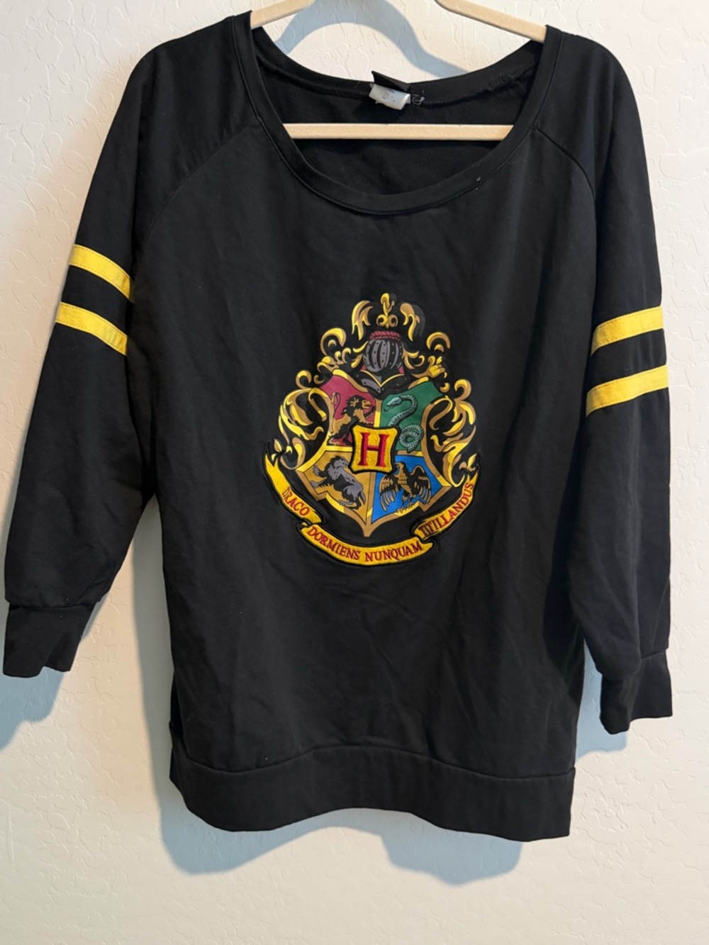 Harry Potter Hogwarts Crest Black Pullover with Yellow Accents